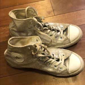 Silver embossed Chuck Taylors
